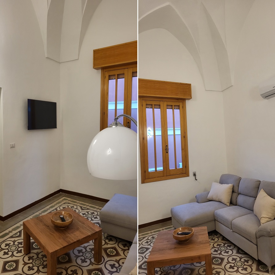 Ferienwohnung Wohnzimmer mit traumhaften Steinboden